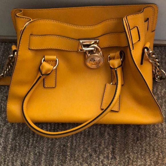 Michael Kors yellow purse. Great condition. - Picture 1 of 3